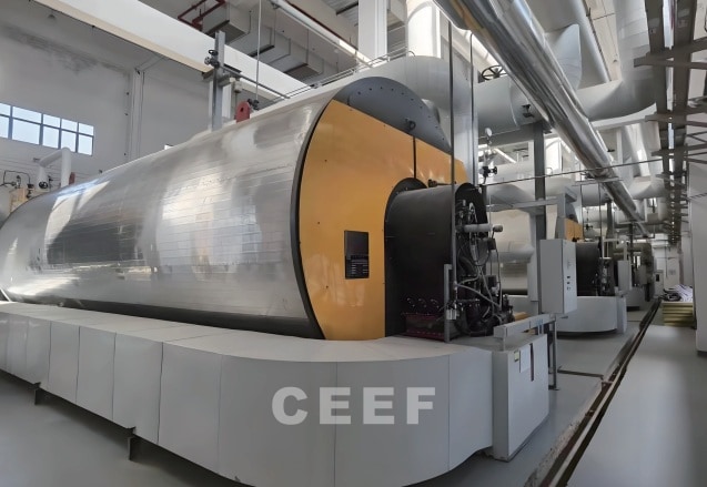 Row of CEEF 9.5 to 18.6 MW gas-fired thermal oil heaters inside a CATL lithium-ion battery factory