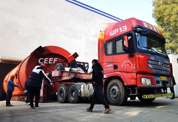Heavy truck transporting CEEF 24.42MW bottom-fired low-NOx thermal oil heater from factory